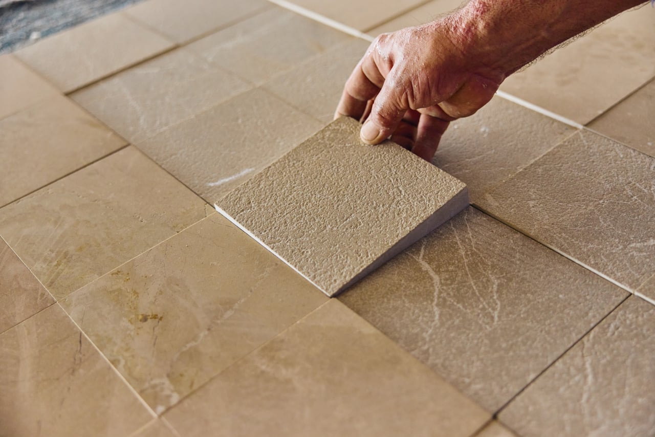 Placing a bush-hammered tile beside polished ones