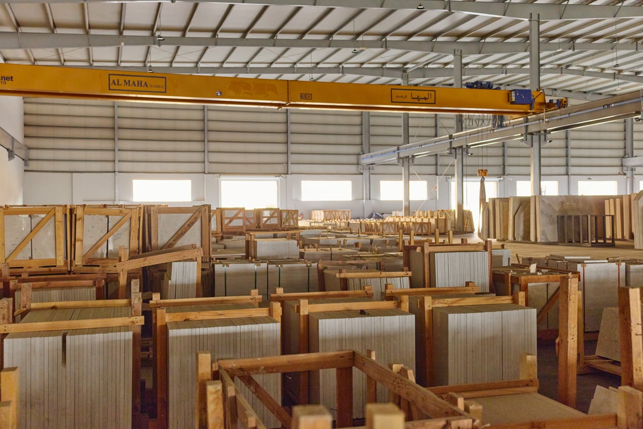 Timber crates arranged in an interior space
